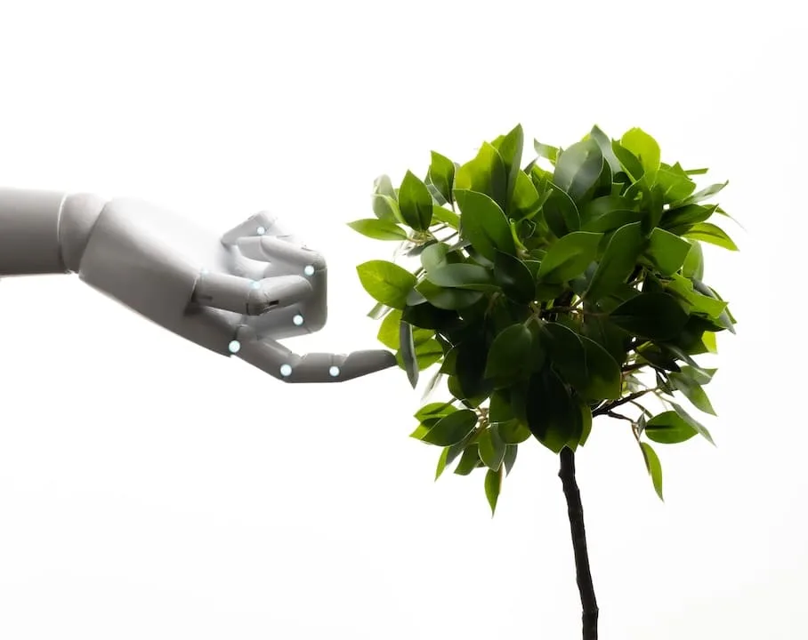 ecology-technology-concept-with-robot-arm-with-green-leaves-isolated-white (2)